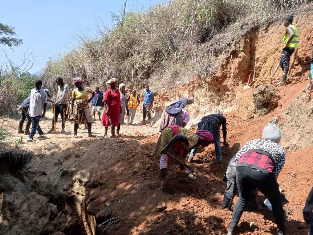 BONANYANG people undertook community work on rehabilitating a section of their Council road that collapsed 04